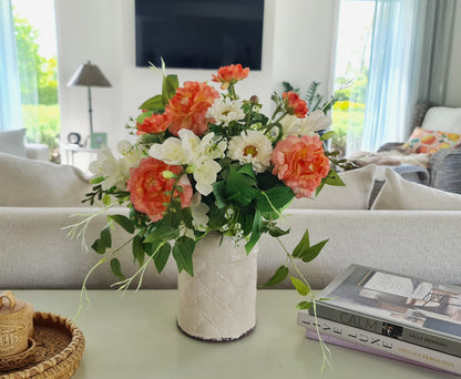 faux floral arrangement for coffee table or hall table mix of peach ranunculus white freesia white daisy set in white aged ceramic vase