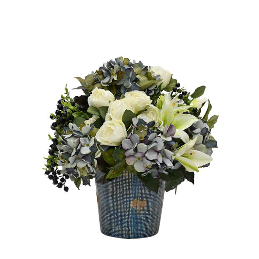 faux floral arrangement blue hydrangeas mix with white lilies white roses in distressed blue ceramic vase
