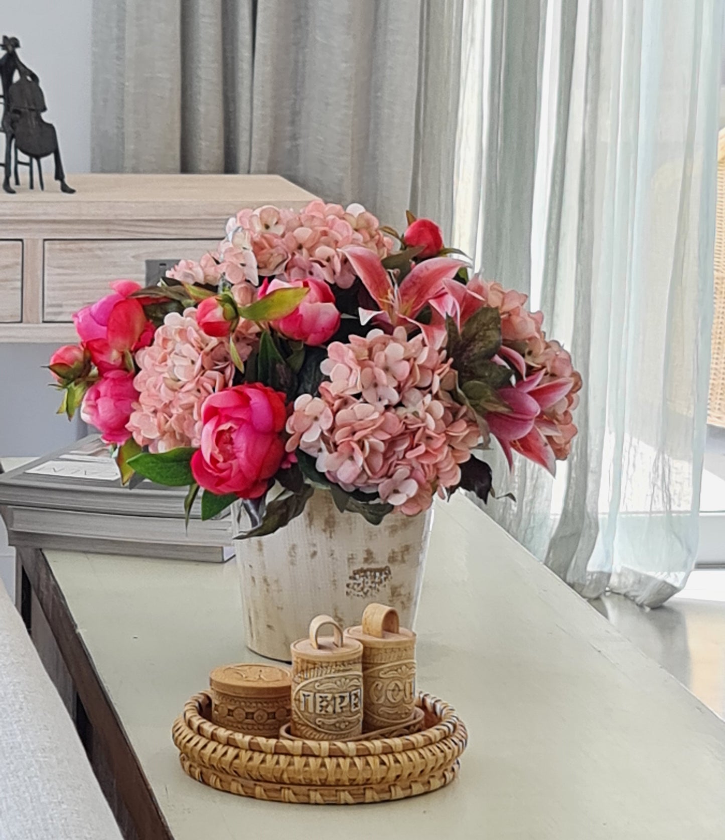 perfect coffee table silk flower arrangement mix of pink hydrangeas pink lilies and pink peonies in rustic distressed ceramic vase