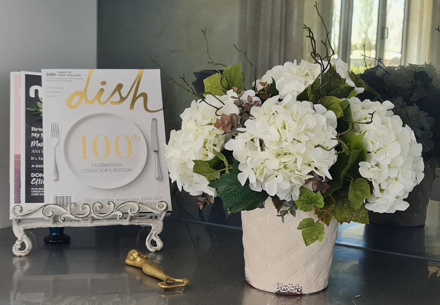 artificial white hydrangeas eucalyptus foliage in aged cream vase kitchen decoration